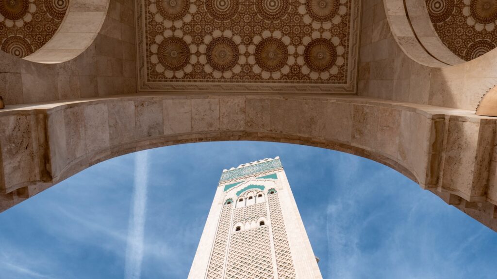 a tall building with a clock on it's side